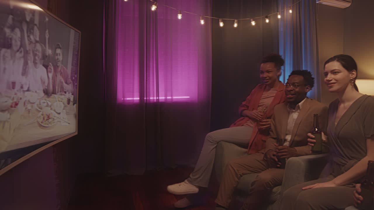 Big Group of Friends Having Distant House Party Together