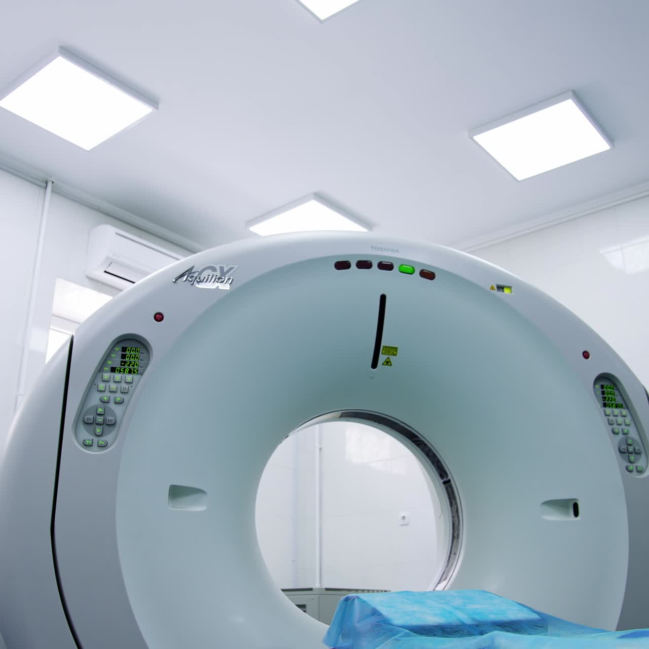 Distancing from advanced tomography equipment in a hospital. Modern laboratory for magnetic scanning. Low angle view