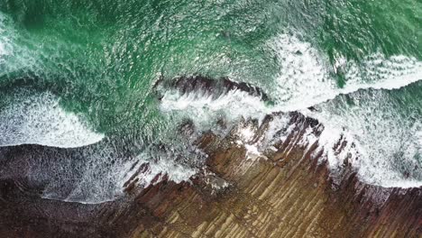 Massive-waves-crashing-rocky-coastline-of-Japanese-Aoshima-island