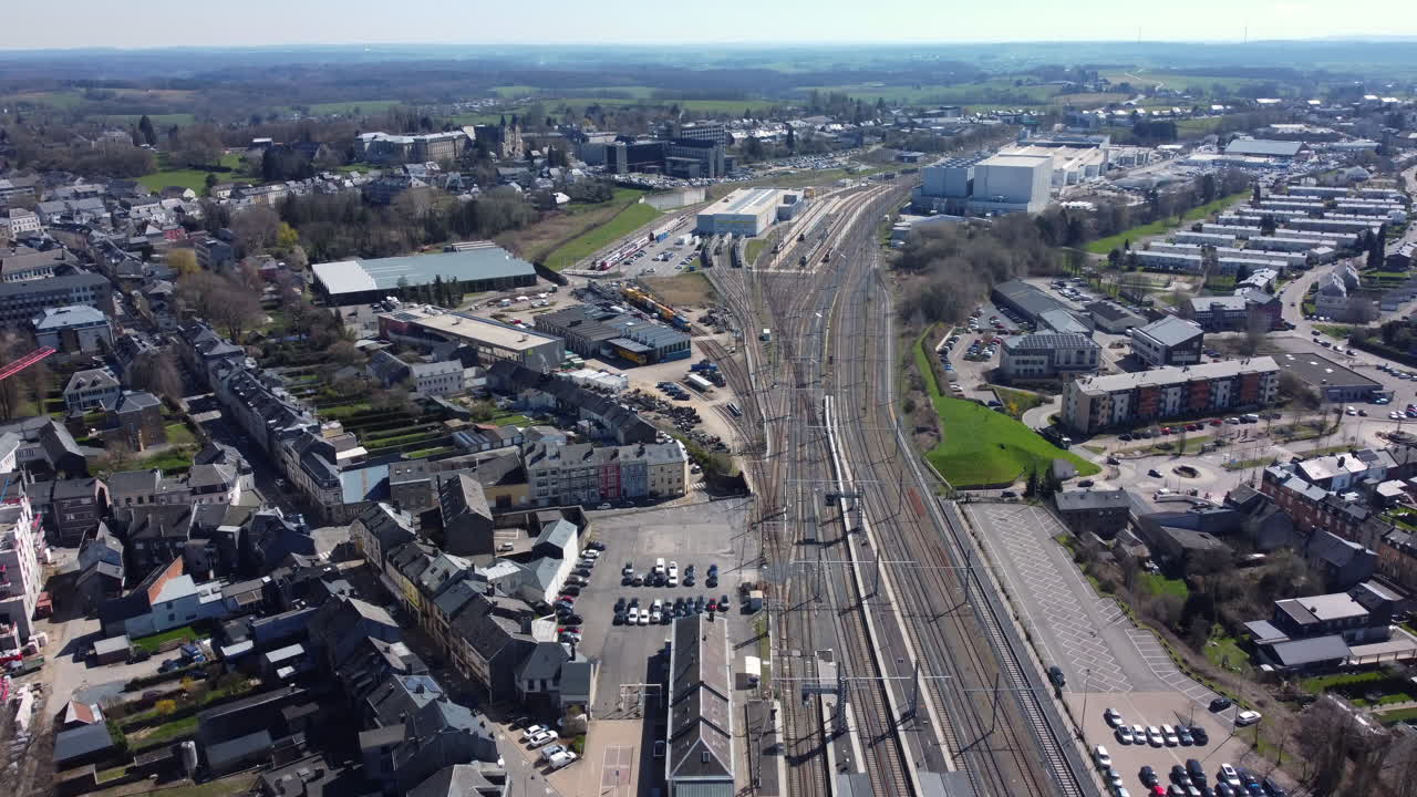 Aerial View of a Belgian Town with Train Tracks