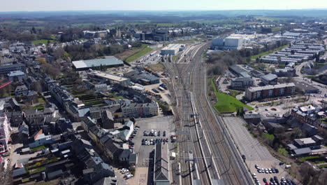 aerial view of a belgian town with train tracks