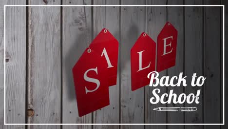 Back-to-school-sale-graphic-on-wooden-background