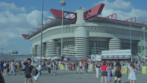 large crowd of people at a taylor swift concert outside san siro stadium in milan