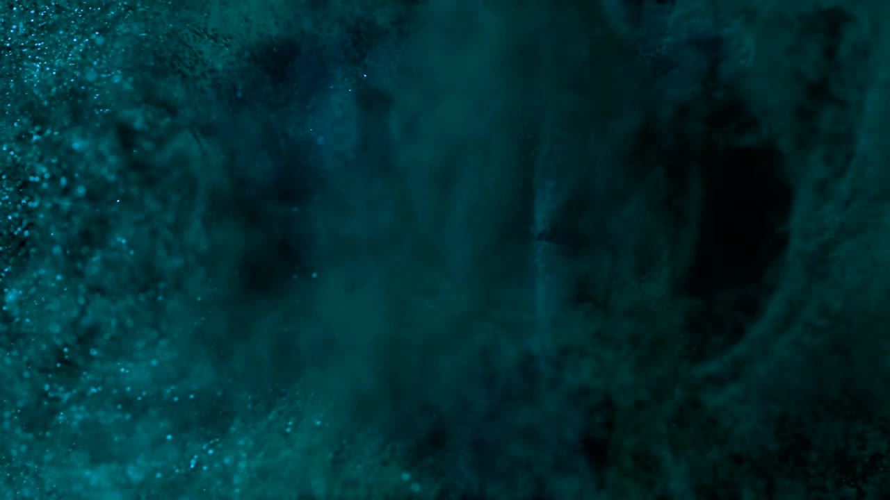 una increíble vista macro de una explosión de polvo de pintura cg.