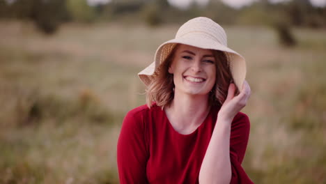 Young-Woman-Walking-On-A-Meadow-Smiling-Into-Camera-Close-Up-4