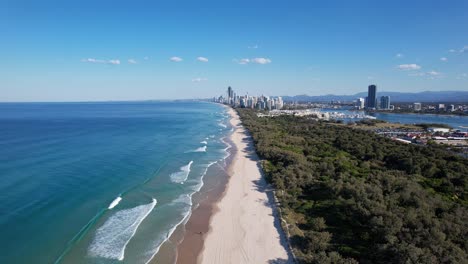 Fly-Over-The-Seaside-Of-Southport-Spit,-Main-Beach-On-The-Gold-Coast,-Queensland,-Australia