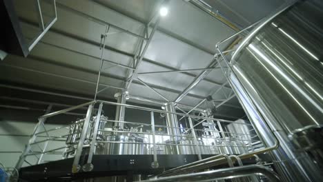 modern craft brewery. craft beer production. modern equipment in brewery, metal tanks, alcoholic drink production