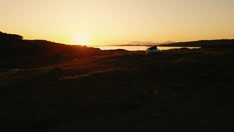 sunset camping van in scotland