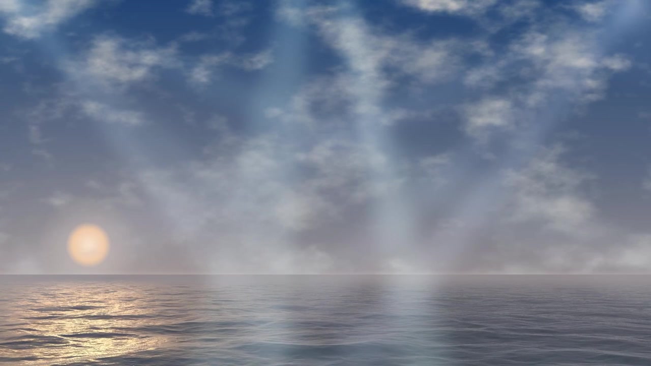 Raggi di sole che filtrano tra le nuvole sull'oceano calmo