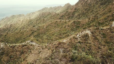 Group-of-hikers-descend-the-Longonot-mountain-in-Kenya---Aerial-High-quality-4k-footage