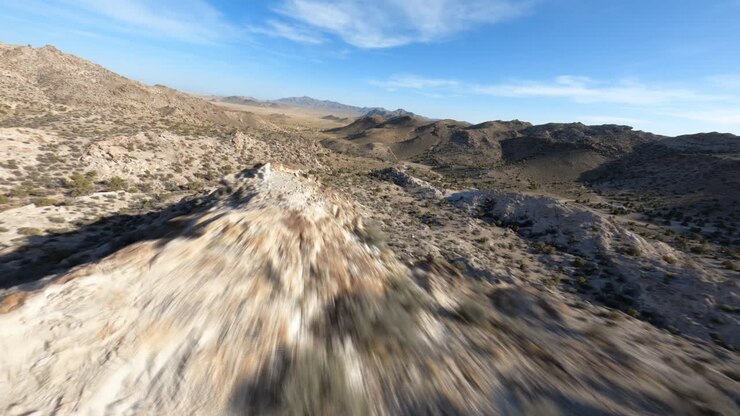 Fast FPV mountain desert dive