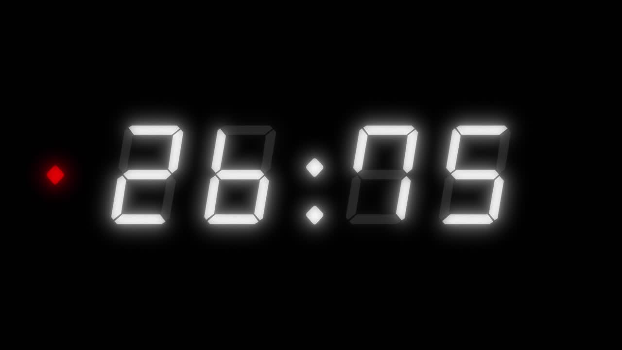 4 digit, 30 second digital clock countdown timer. White digits on black color background with a red light beside the timer. Retro digital alarm clock