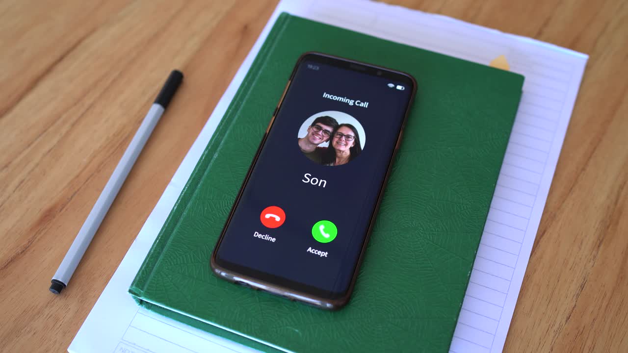 Incoming call from your son. Concept of stay in touch with the family.