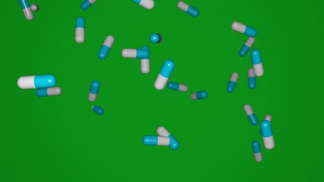 many pills falling down on blue background.