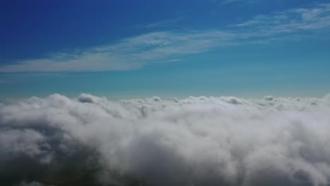 clouds atmosphere. flying over white clouds in the sky. beautiful background of soft clouds moving slowly. aerial view.
