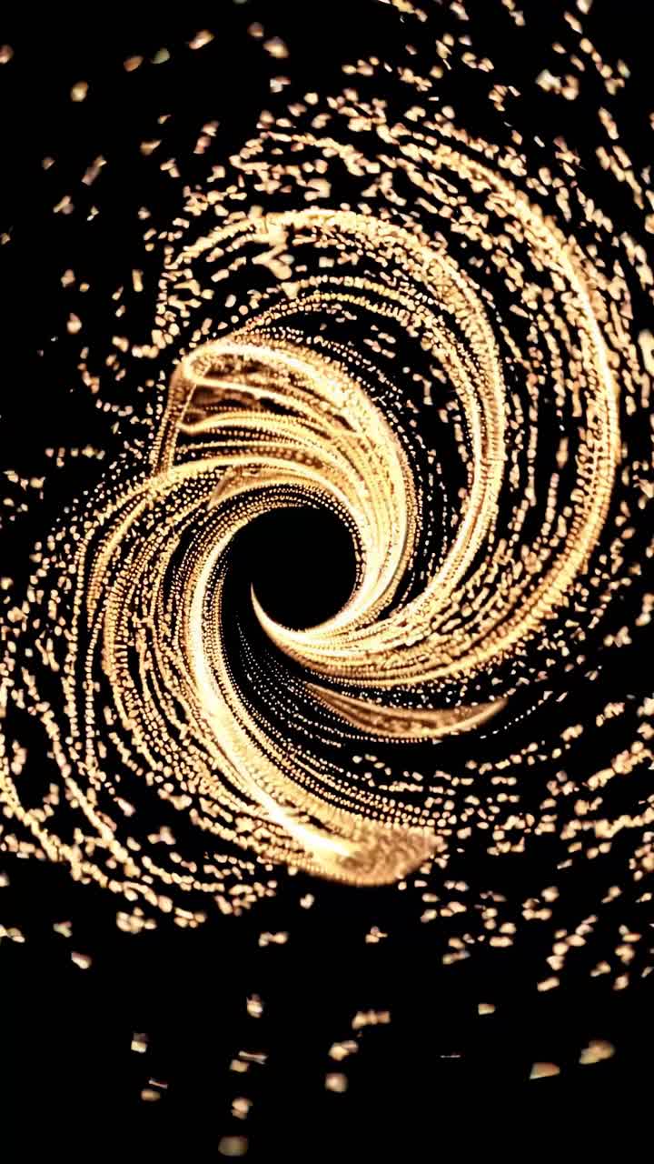 Spirale di luci dorate crea un effetto vortice, ripresa dall'alto.