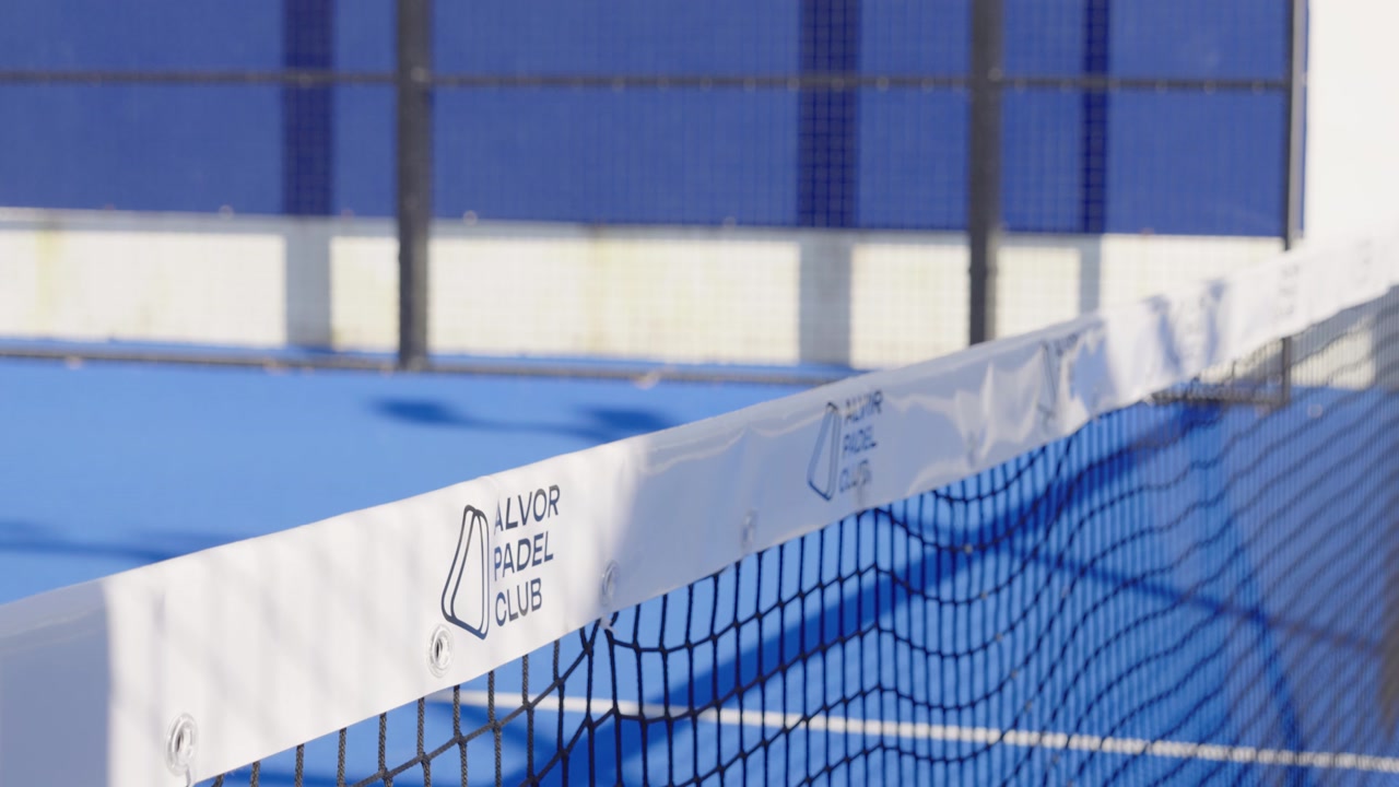 Close-up shot of a paddle tennis net highlighting texture and detail.
