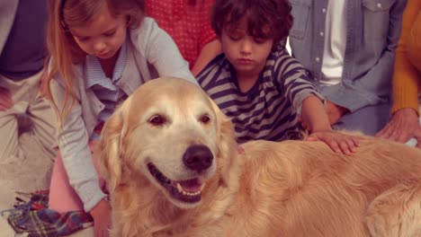 Happy-extended-family-smiling-with-dog