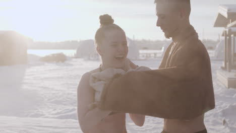 couple standing out of the pool