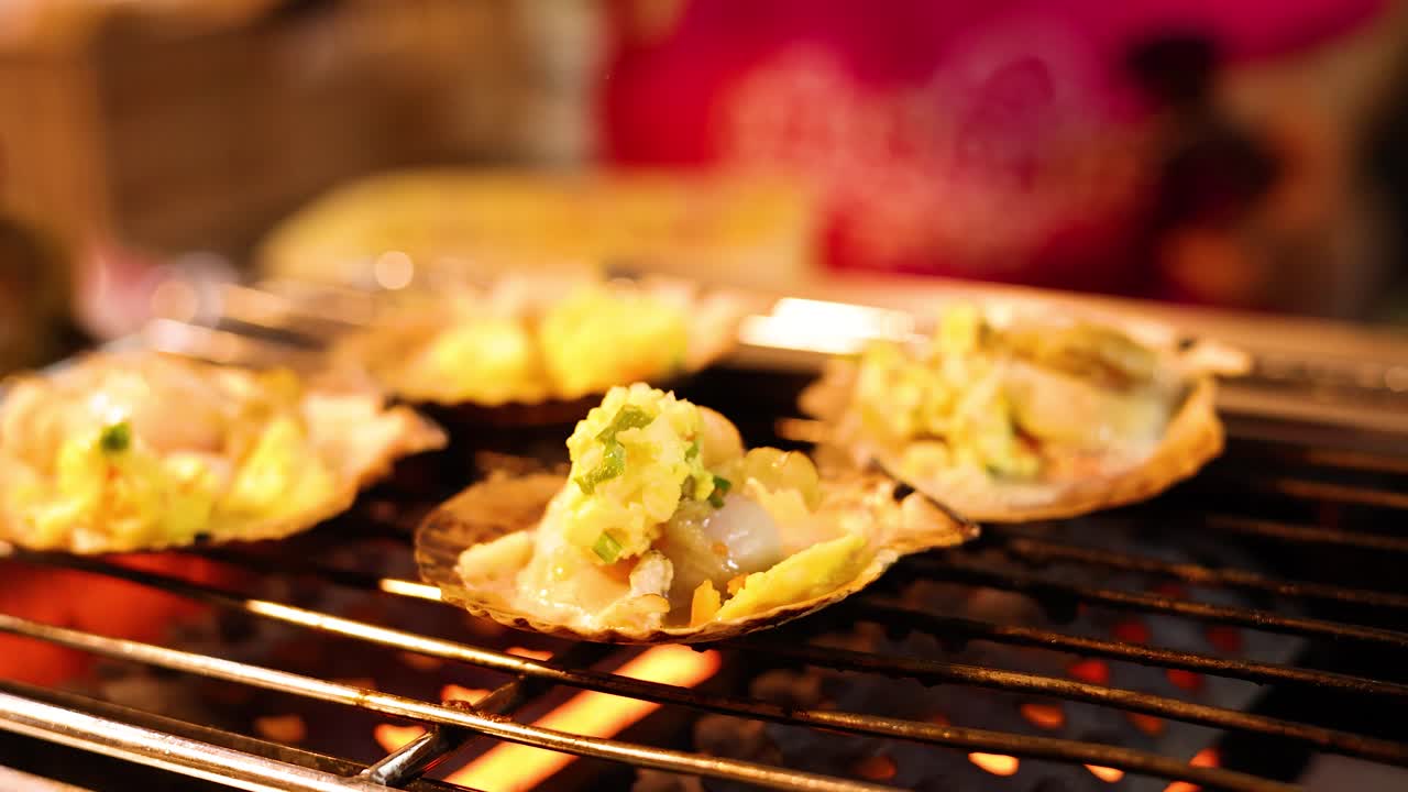Scallops grilled over open flame, topped with garlic butter, vibrant street food scene, warm lighting