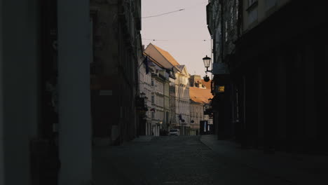 narrow city alley at sunset