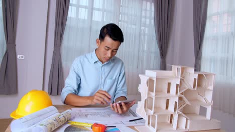 architect working with construction plans