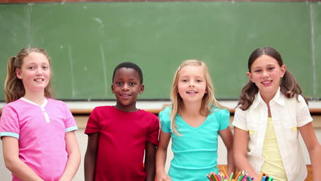 pupils raising their arms