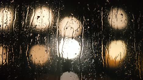 various shots and camera movement of detailed rain drops falling on window