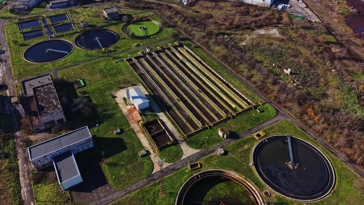 Water treatment facility shows tanks and processing areas from above