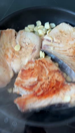 potatoes and vegetables baking in an oven