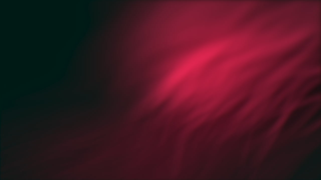 Dramatic red curtain drapes against black background