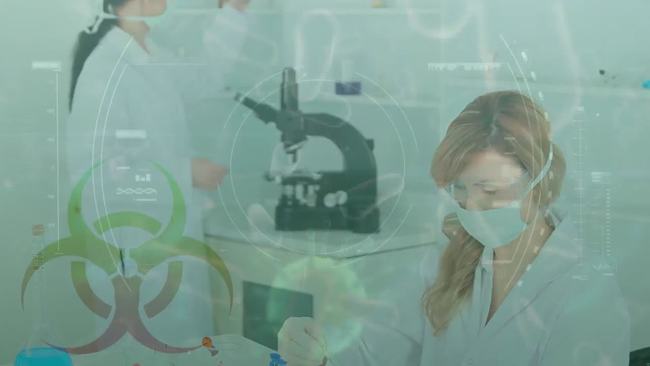 코로나19가 백그라운드에서 실험실에서 일하는 과학자들에게 퍼지고 있습니다.