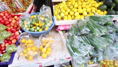 assorted vegetables arranged on a market stall