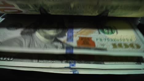 counting hundred dollar bills