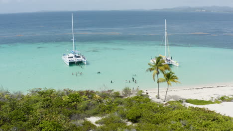 yacht's with tourists on tropical puerto rico vacation to cayo icacos