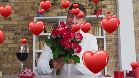 animation of hearts flying over caucasian man proposing with red roses on video call