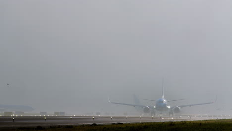 airplane taking off or landing in foggy conditions