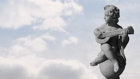 animation of stone sculpture over sky with clouds