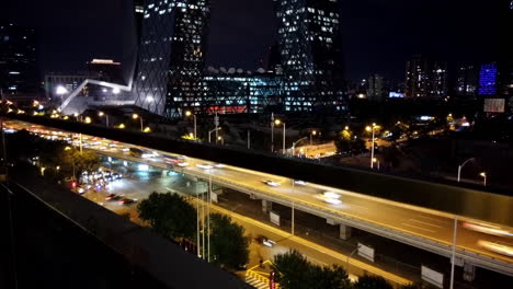 CCTV-Building,-Beijing,-China,Traffic,-Night-Time,-Time-Lapse,-Still-Cam,-5-Sec