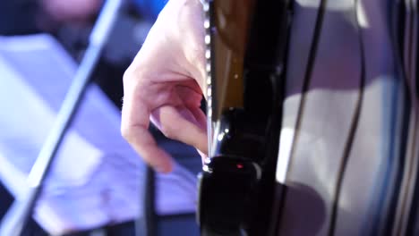 close-up of a guitarist playing