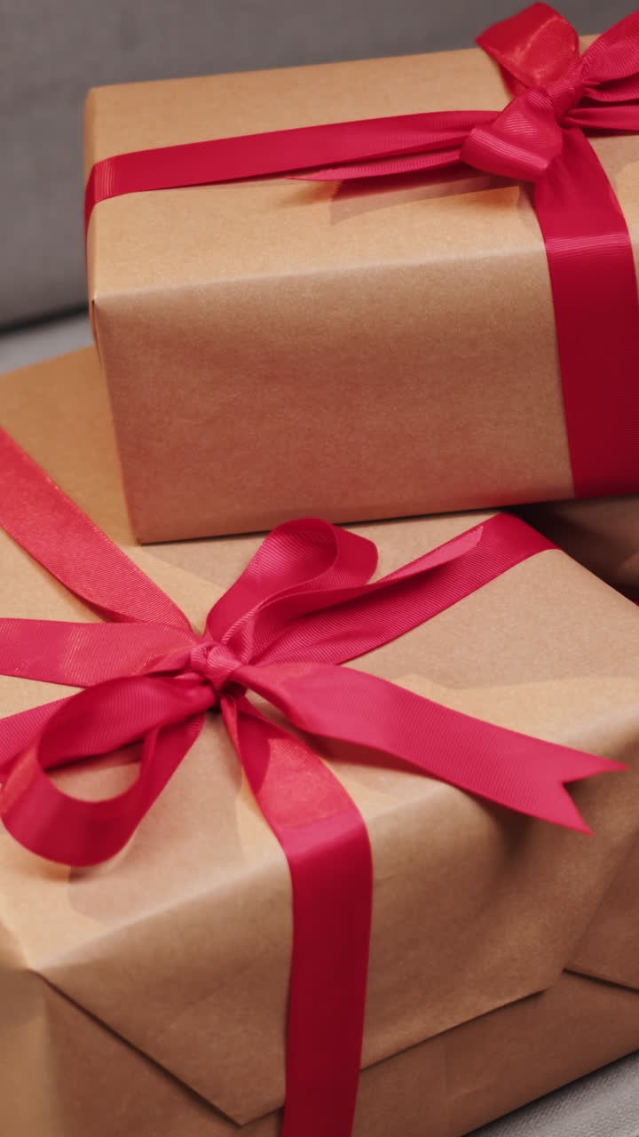 Wrapped gifts with red ribbon