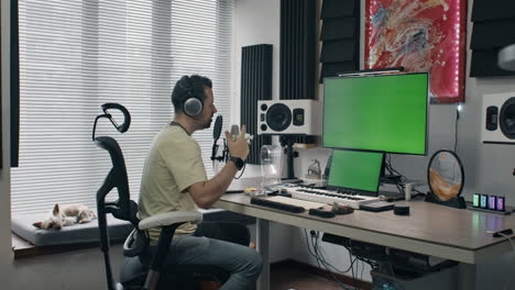 man working in a home recording studio