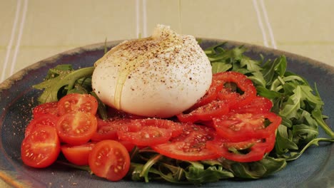 burrata salad with cherry tomatoes and arugula
