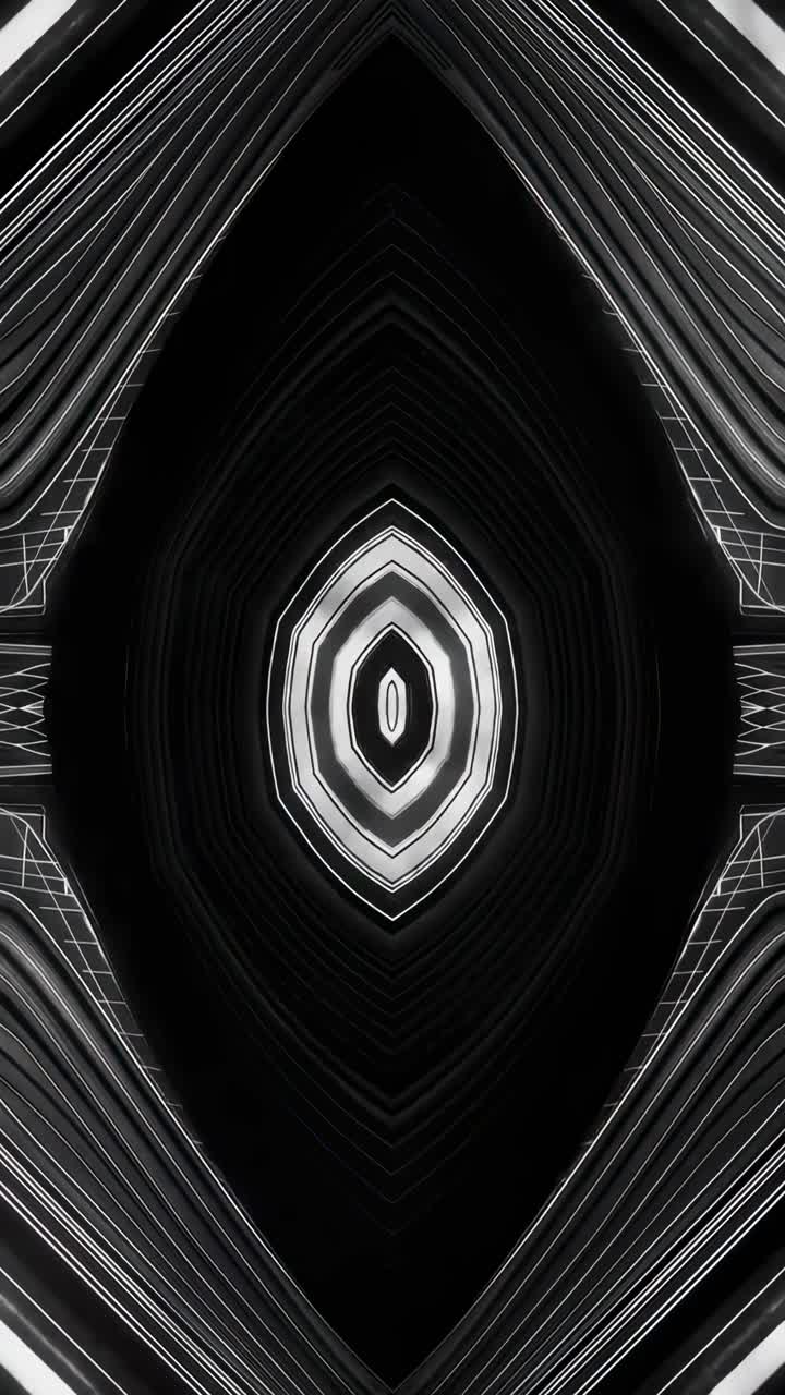 Abstrakt sort-hvidt kaleidoskopmønster, set oppefra, ideelt til videobaggrunde.