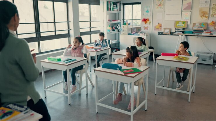 Teacher, classroom and children listening