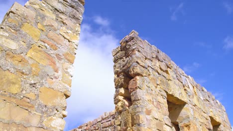 ruined stonewall on a sunny day 4k