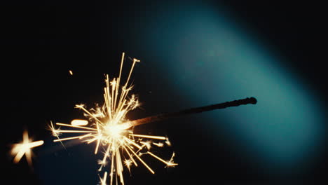 a sparkler burn in the dark room