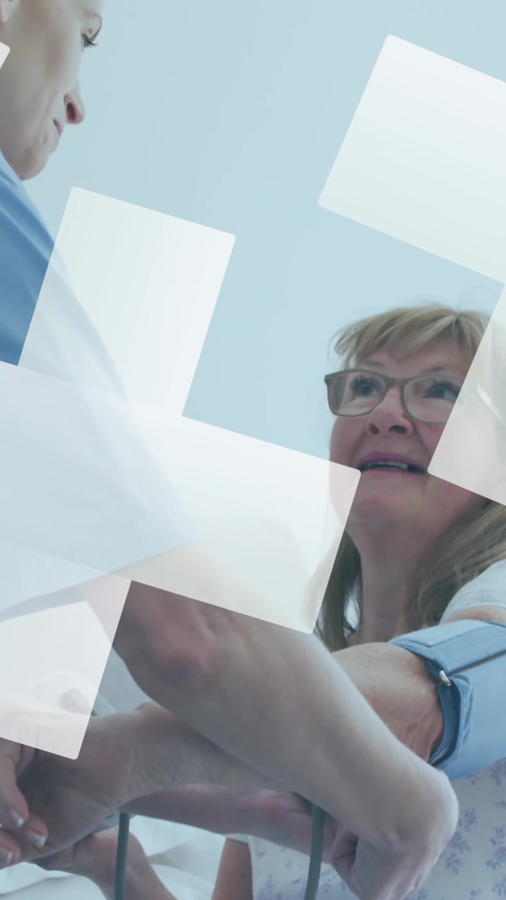 Animation of crosses over caucasian female doctor and senior patient talking