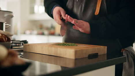 chef chopping herbs