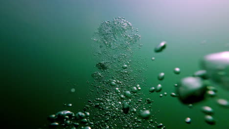 Underwater-bubble-in-green-clean-lake-water,-POV-view